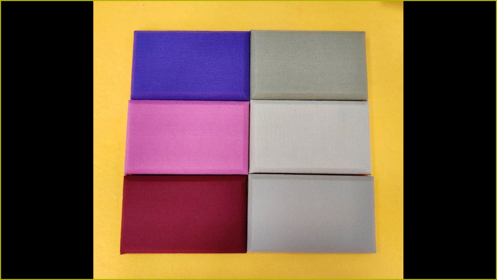 多种颜色布艺软包吸音板样品,织物面料包覆高密度海绵,墙面吸音防撞装饰材料
